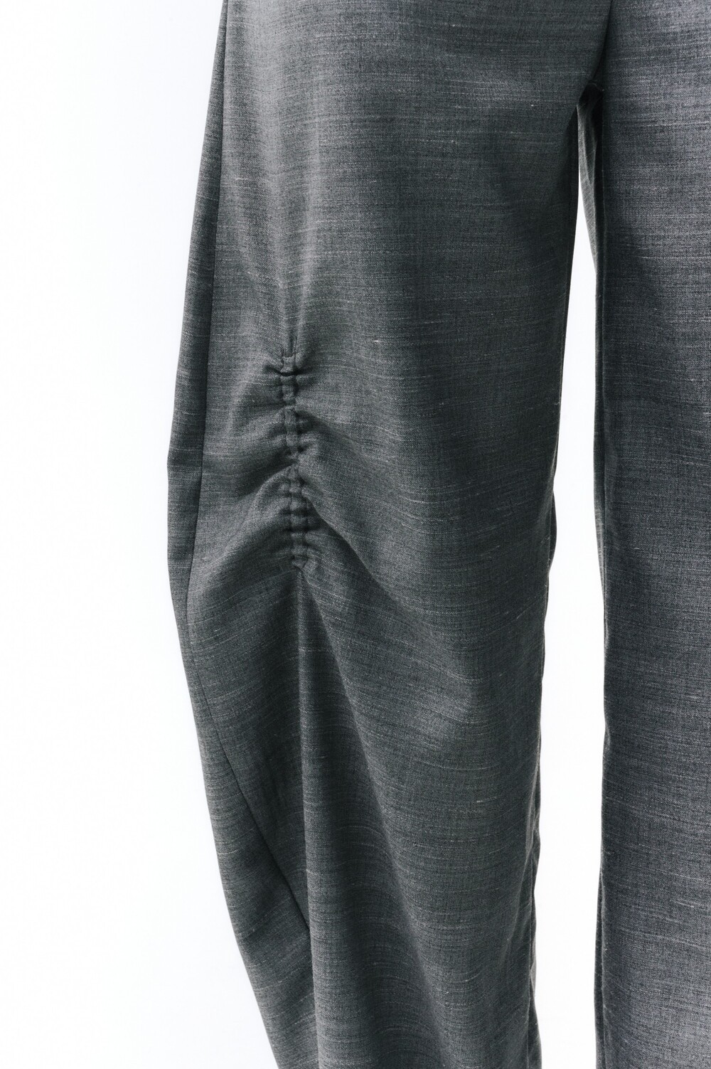 Gray trousers with pintucks